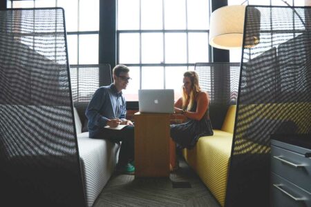 man interviewing a digital marketing candidate questions