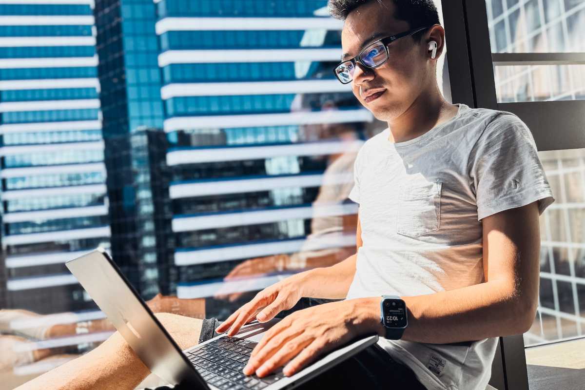 freelance writer working on a laptop